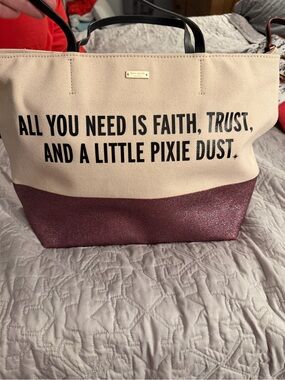 kate spade cream and pink glitter two-tone tote with black text